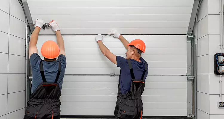 Garage Door Bottom Panel Repair in Southchase, FL